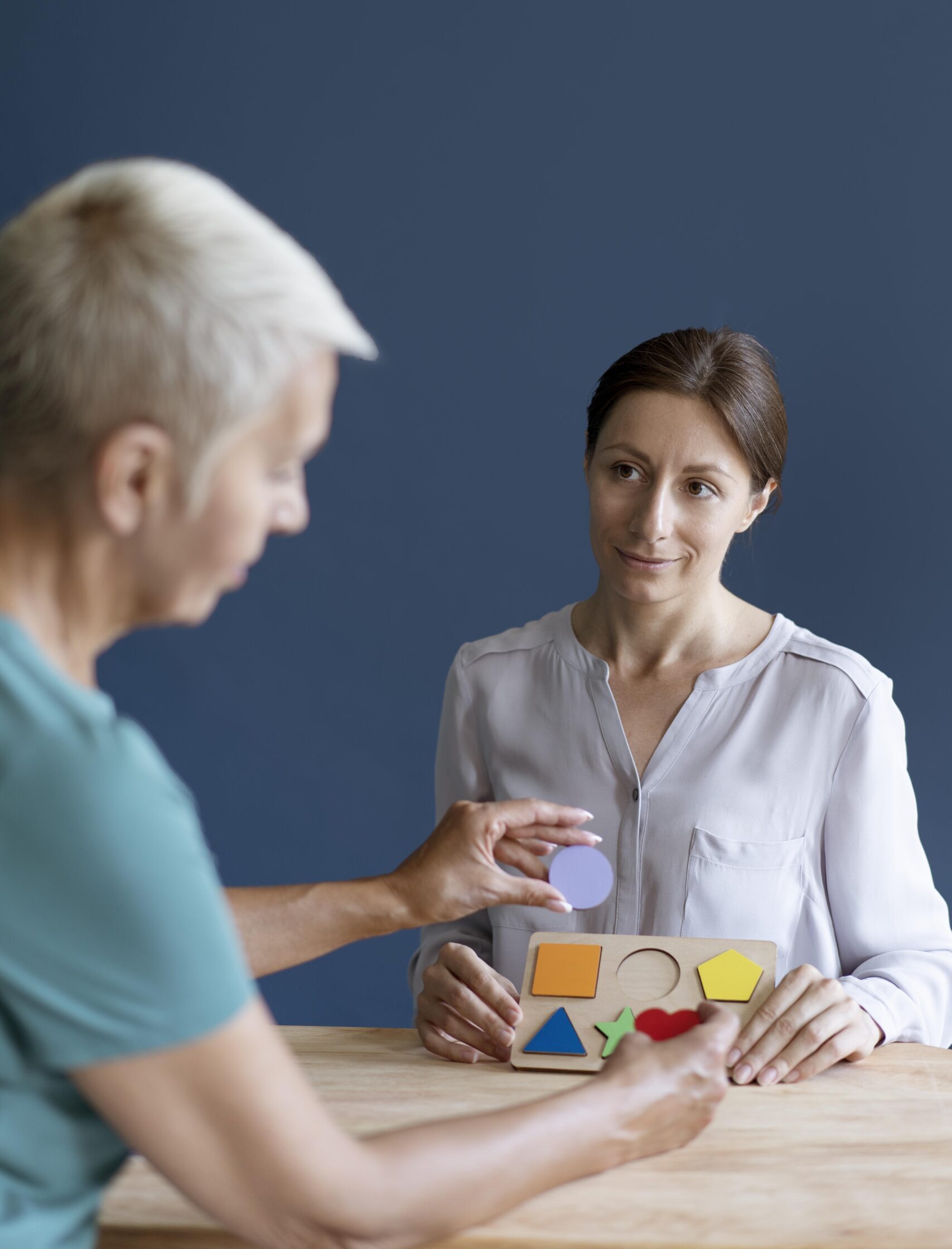woman-doing-occupational-therapy-session-with-psychologist
